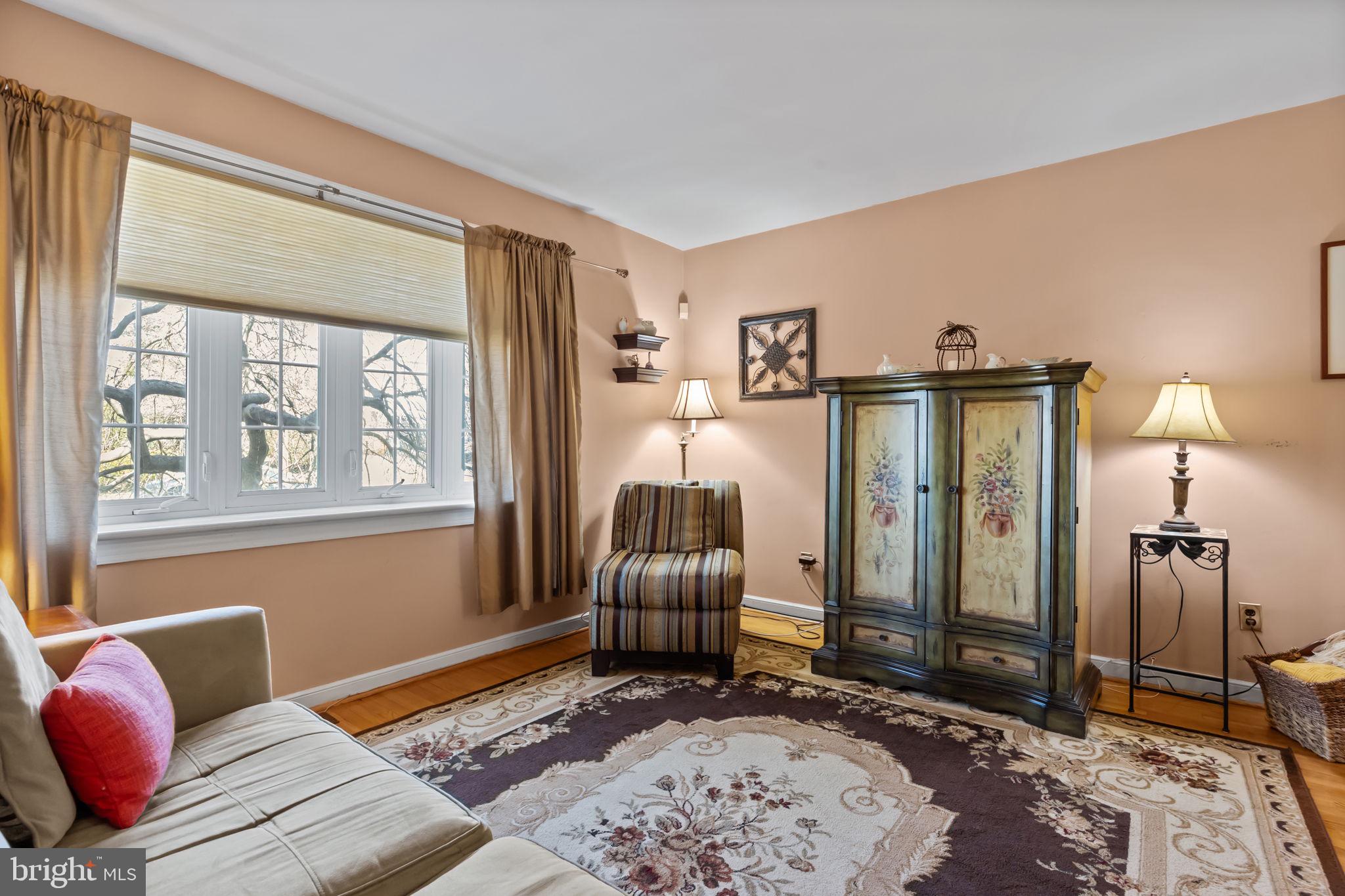 211 Rolling Hill Road Elkins Park, PA 19027 - Photo 7 of 41 a bedroom with furniture or couch and a window