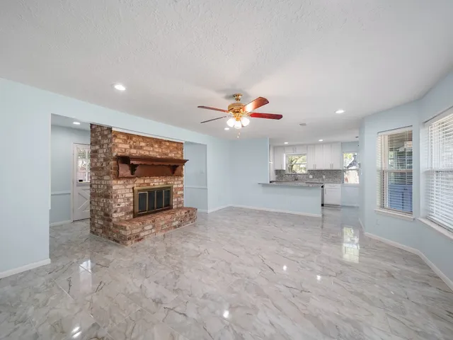 a view of a livingroom with a staircase
