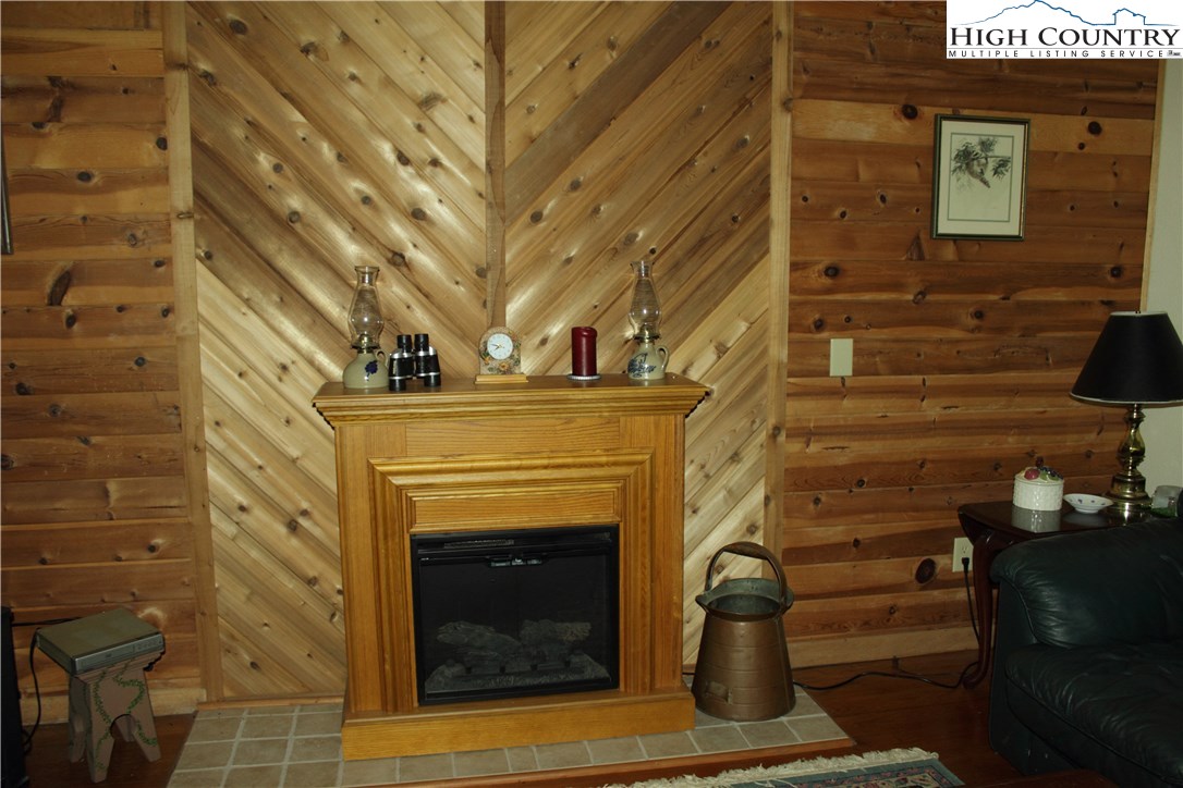 238 Misty Ridge Road Millers Creek, NC 28651 - Photo 4 of 22 a close view of a fireplace in the room