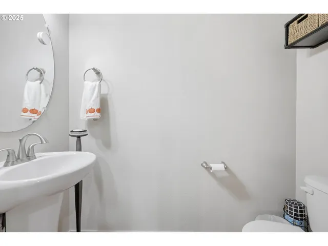 a bathroom with a sink and mirror