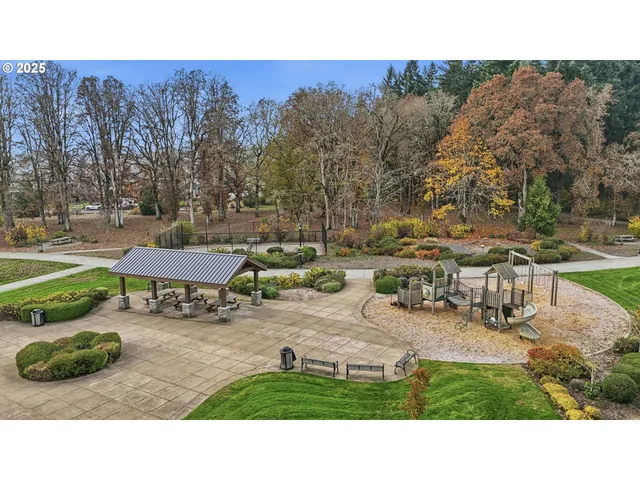 an aerial view of a house with a garden