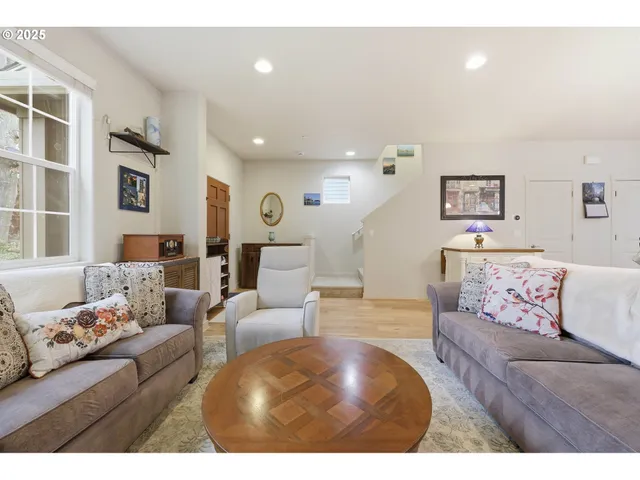 a living room with furniture and a couch