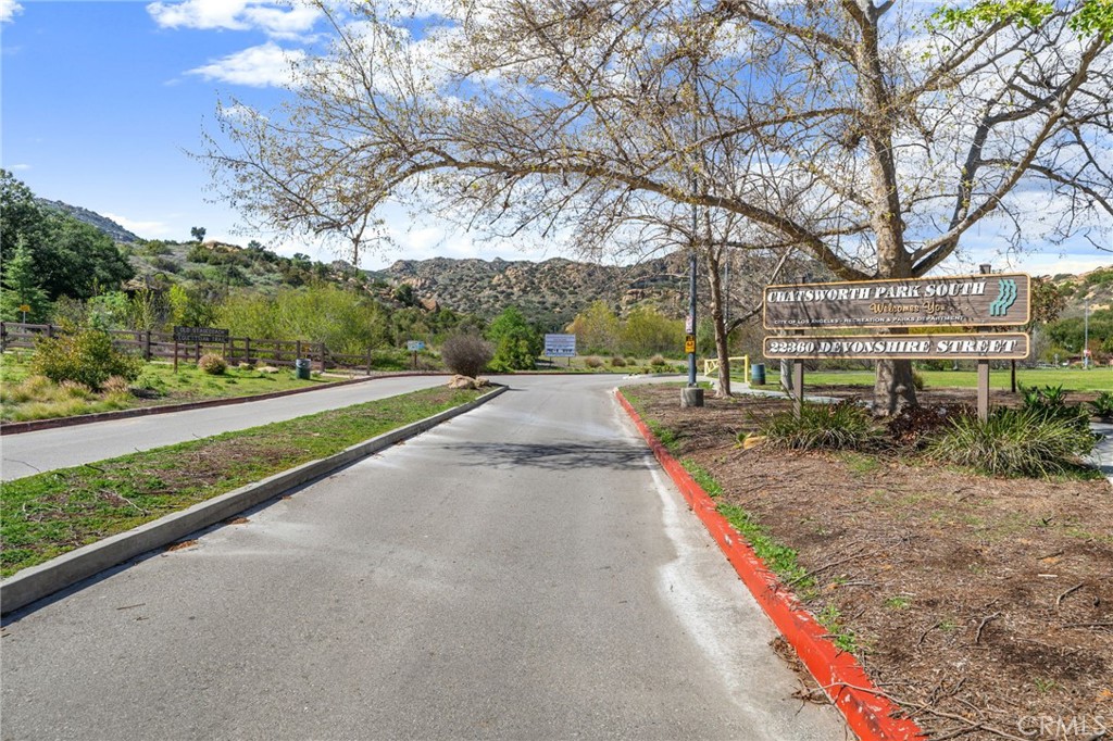 10179 Larwin Avenue, Unit 5 Chatsworth, CA 91311 - Photo 36 of 53 a view of a park with large trees