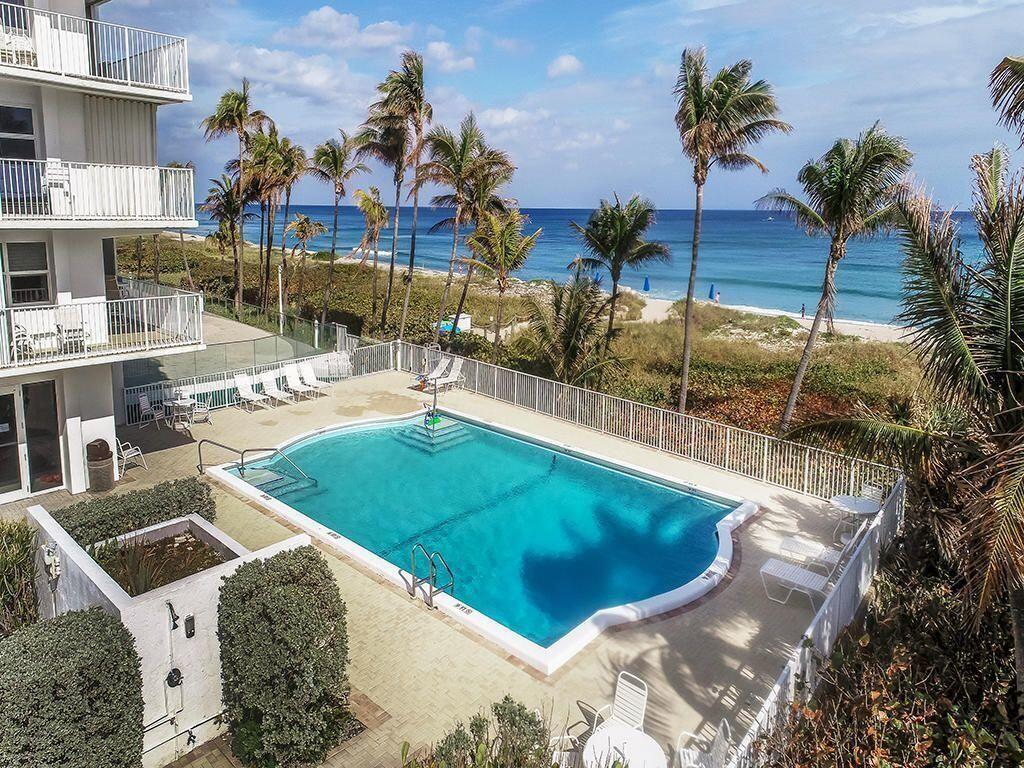 3000 South Ocean Boulevard, Unit 304 Boca Raton, FL 33432 - Photo 24 of 41 a view of a swimming pool with a patio