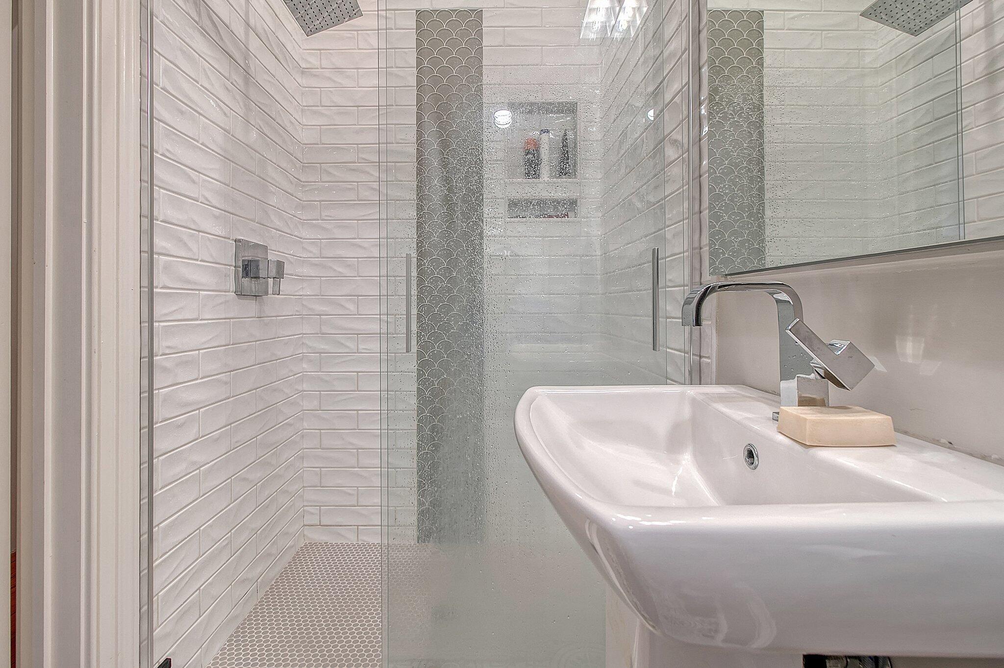 105 Bull Street, Unit A Charleston, SC 29401 - Photo 28 of 45 Walk-in Tiled Shower