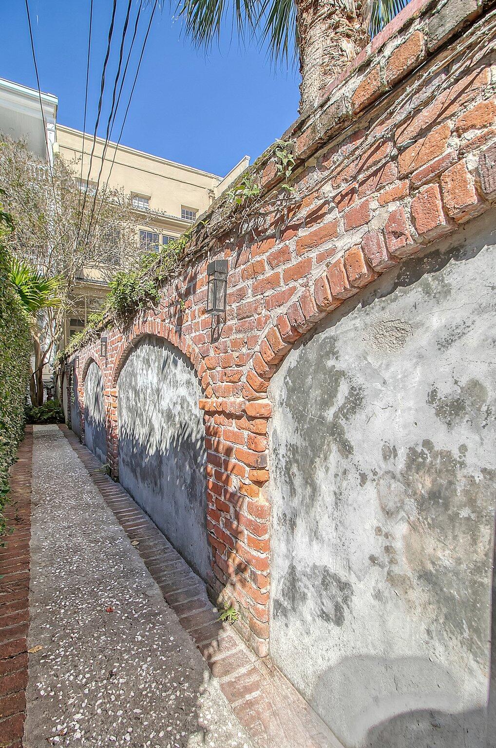 105 Bull Street, Unit A Charleston, SC 29401 - Photo 32 of 45 Original Garden Wall