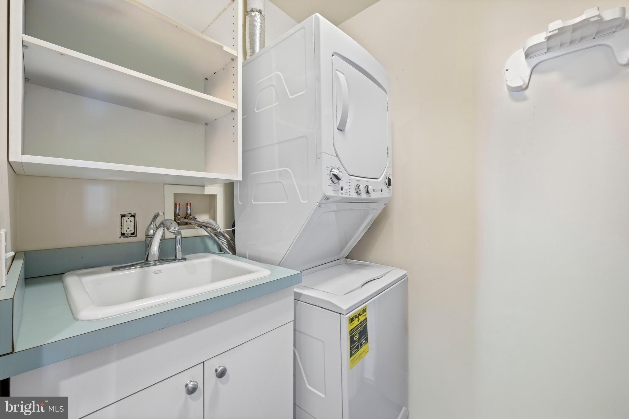 717 President Street, Unit 504 Baltimore, MD 21202 - Photo 29 of 29 a bathroom with a sink and a mirror