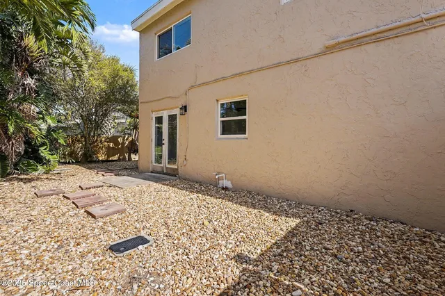 a house view with a backyard