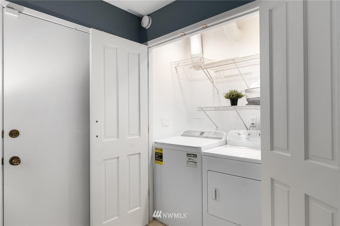 707 Harvest Road Bothell, WA 98012 - Photo 20 of 27 a bathroom with a sink and a mirror