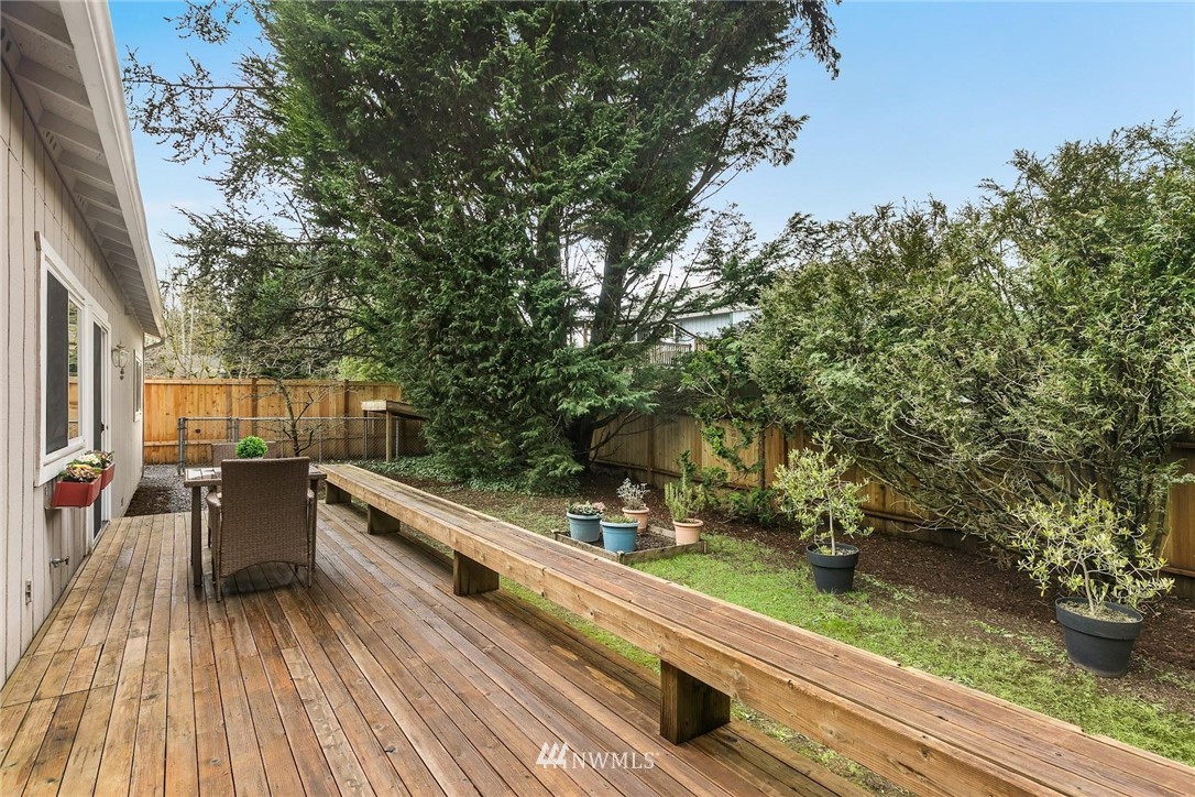 707 Harvest Road Bothell, WA 98012 - Photo 24 of 27 swimming pool view with a seating space