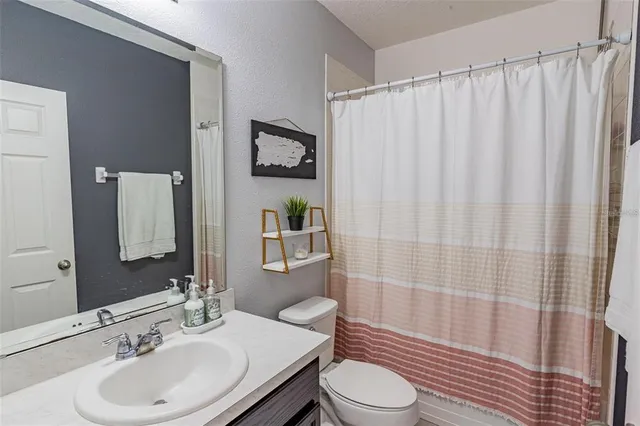 a bathroom with a tub and a shower