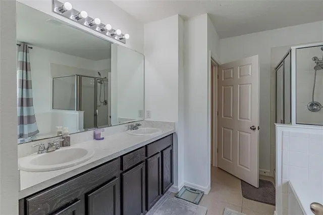 a dining room with furniture and a floor to ceiling window