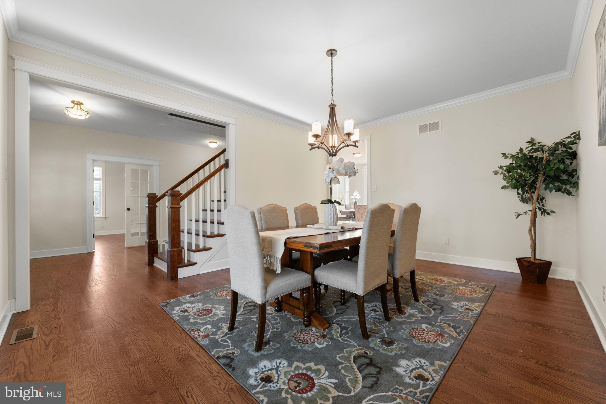 129 Conestoga Road Malvern, PA 19355 - Photo 11 of 69 a view of a dining room with furniture and wooden floor