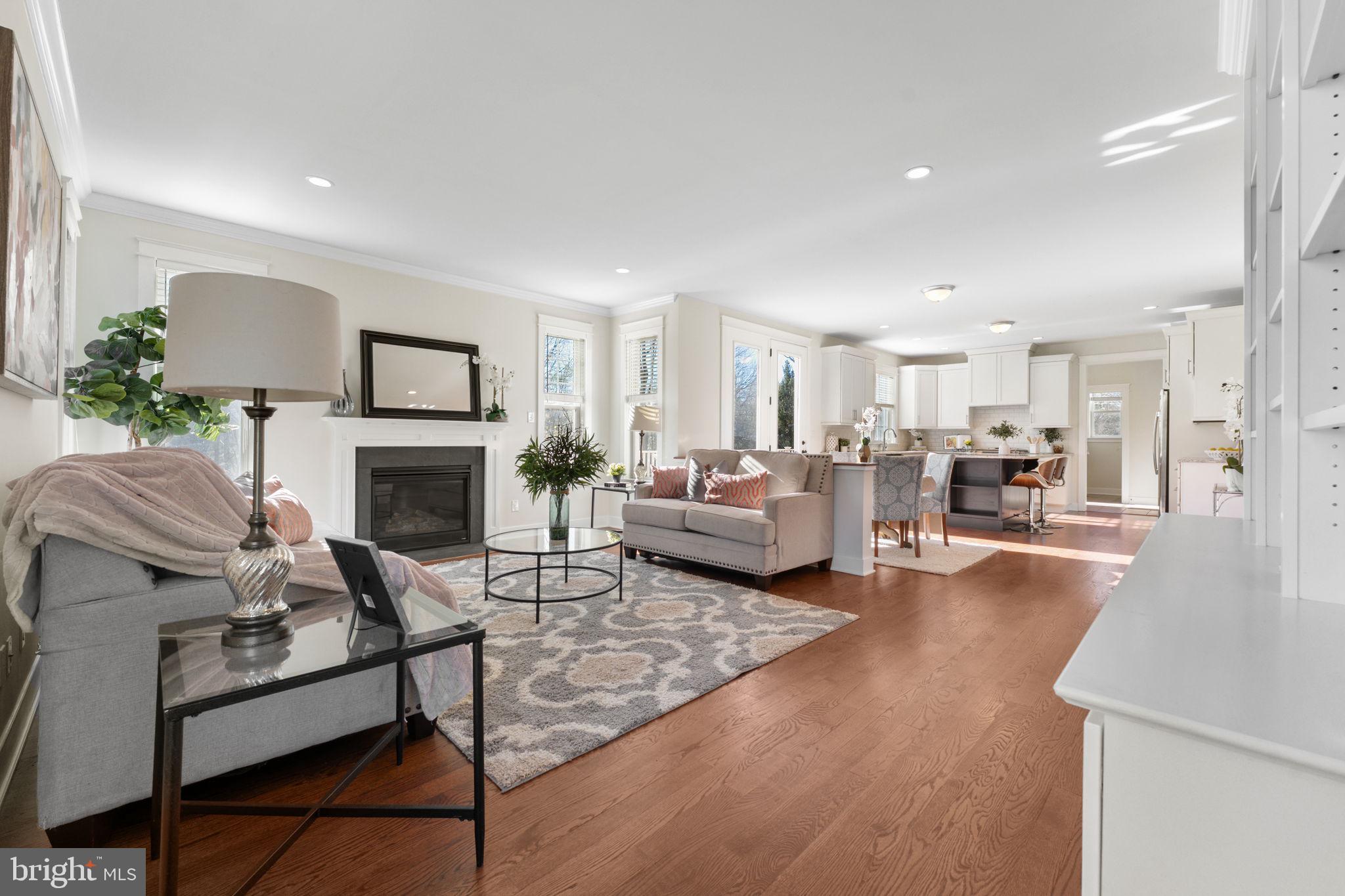 129 Conestoga Road Malvern, PA 19355 - Photo 14 of 69 a living room with furniture fireplace and a table