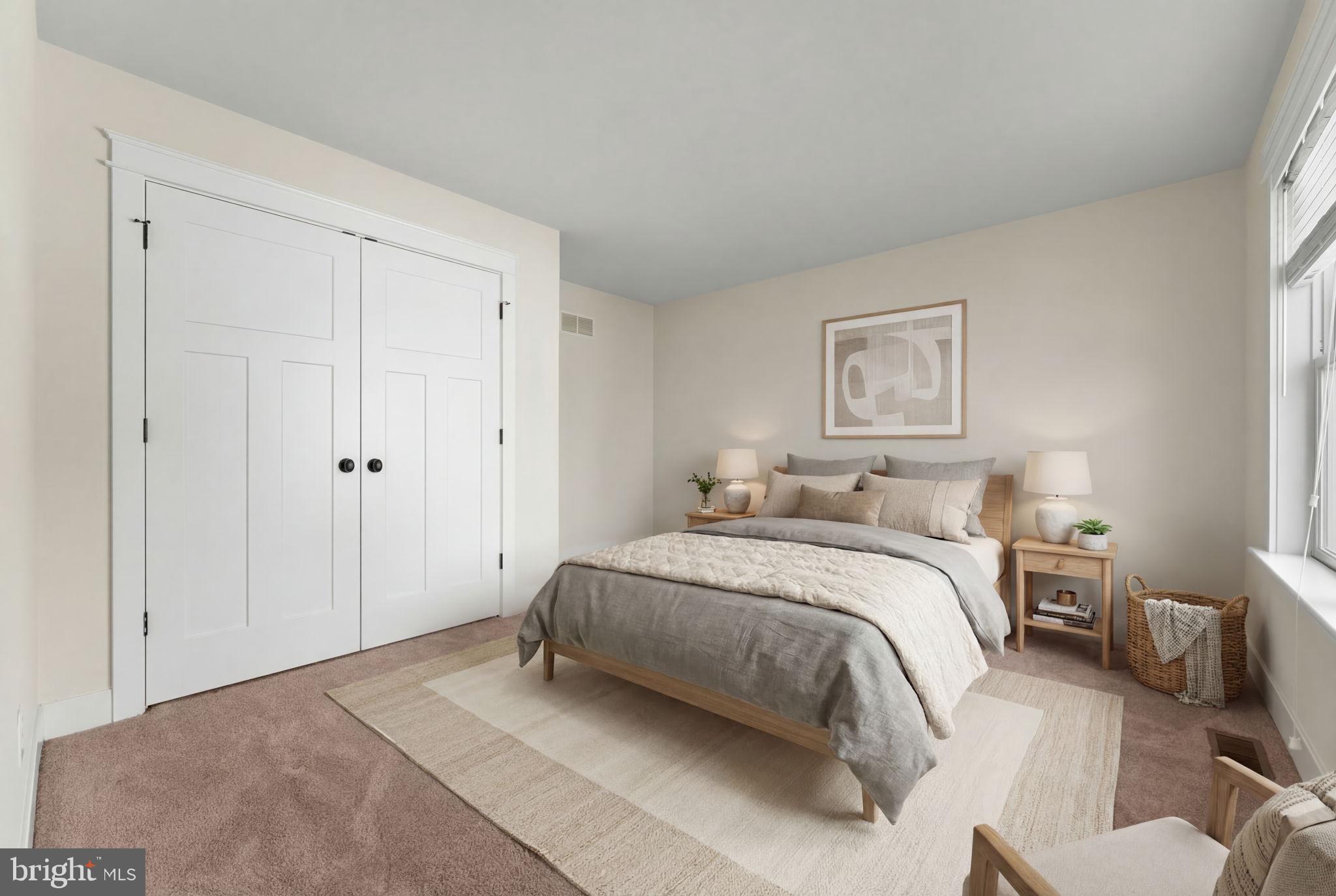 129 Conestoga Road Malvern, PA 19355 - Photo 43 of 69 a spacious bedroom with a bed and a couch