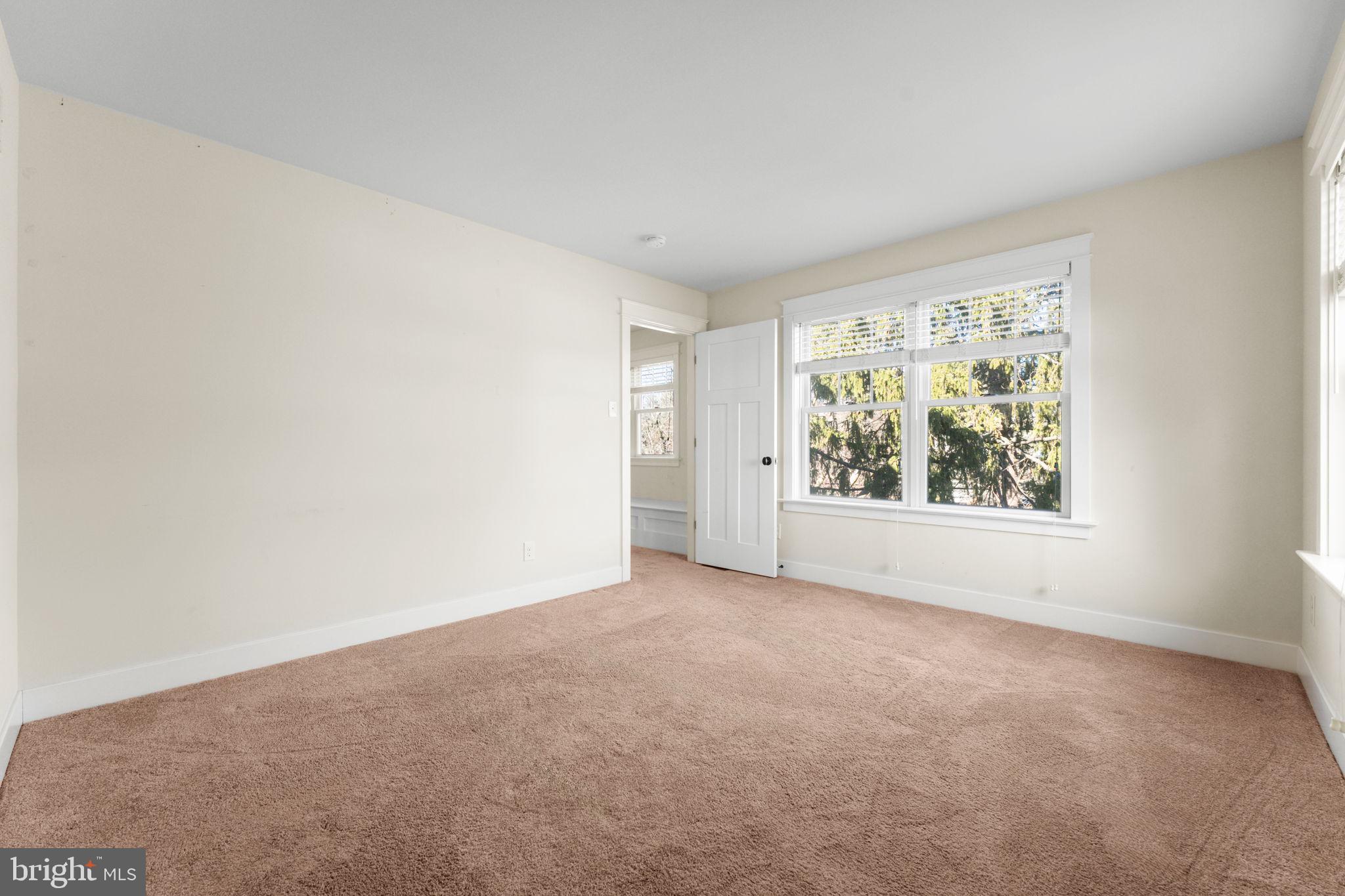 129 Conestoga Road Malvern, PA 19355 - Photo 44 of 69 an empty room with windows