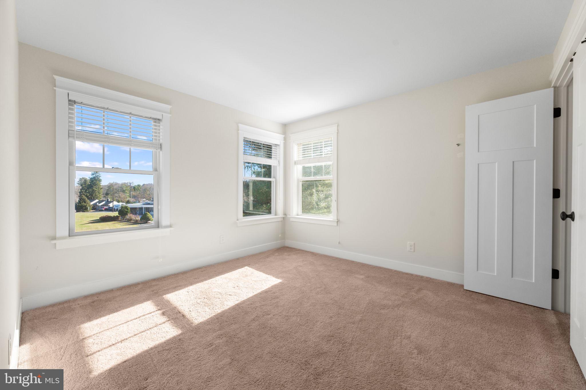 129 Conestoga Road Malvern, PA 19355 - Photo 49 of 69 a view of an empty room with a window