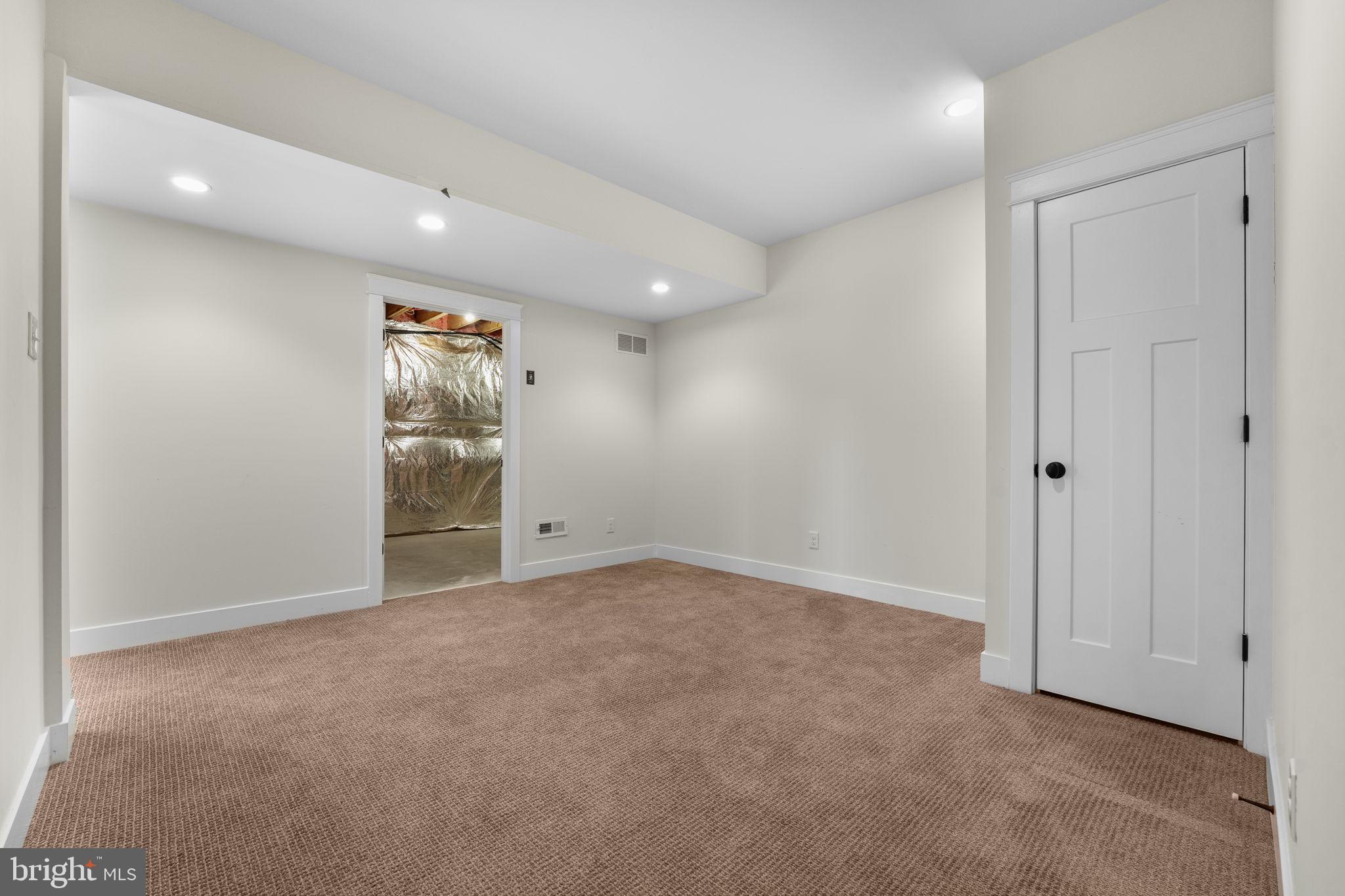 129 Conestoga Road Malvern, PA 19355 - Photo 53 of 69 an empty room with windows