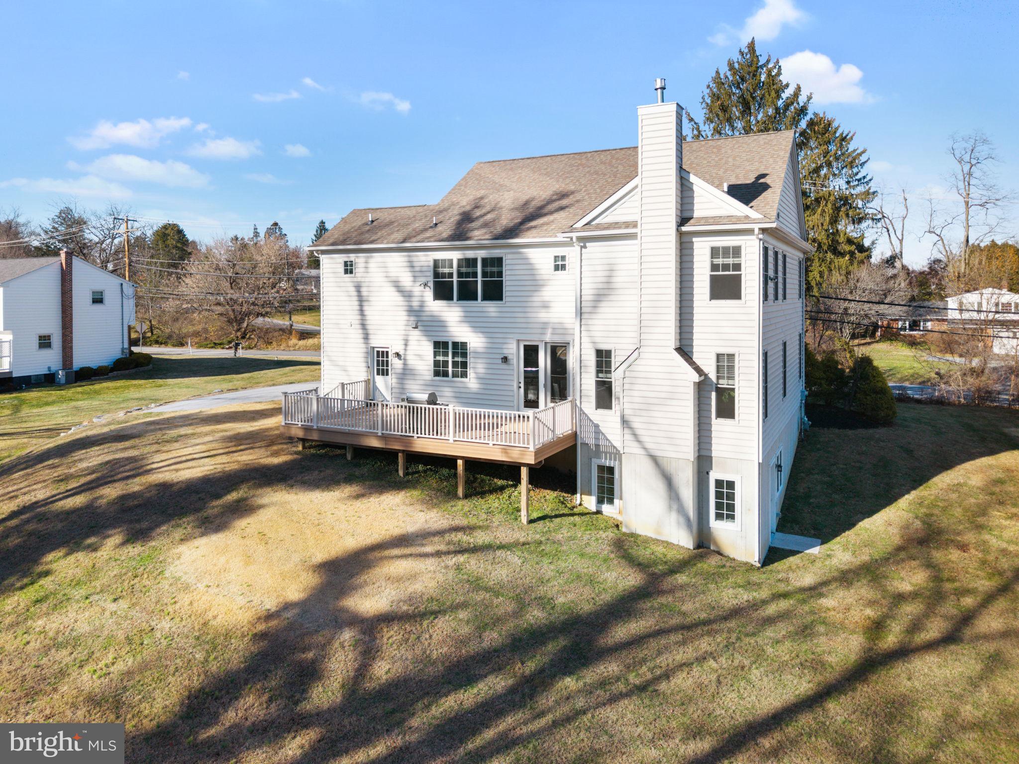129 Conestoga Road Malvern, PA 19355 - Photo 61 of 69 a view of a house with backyard and sitting area
