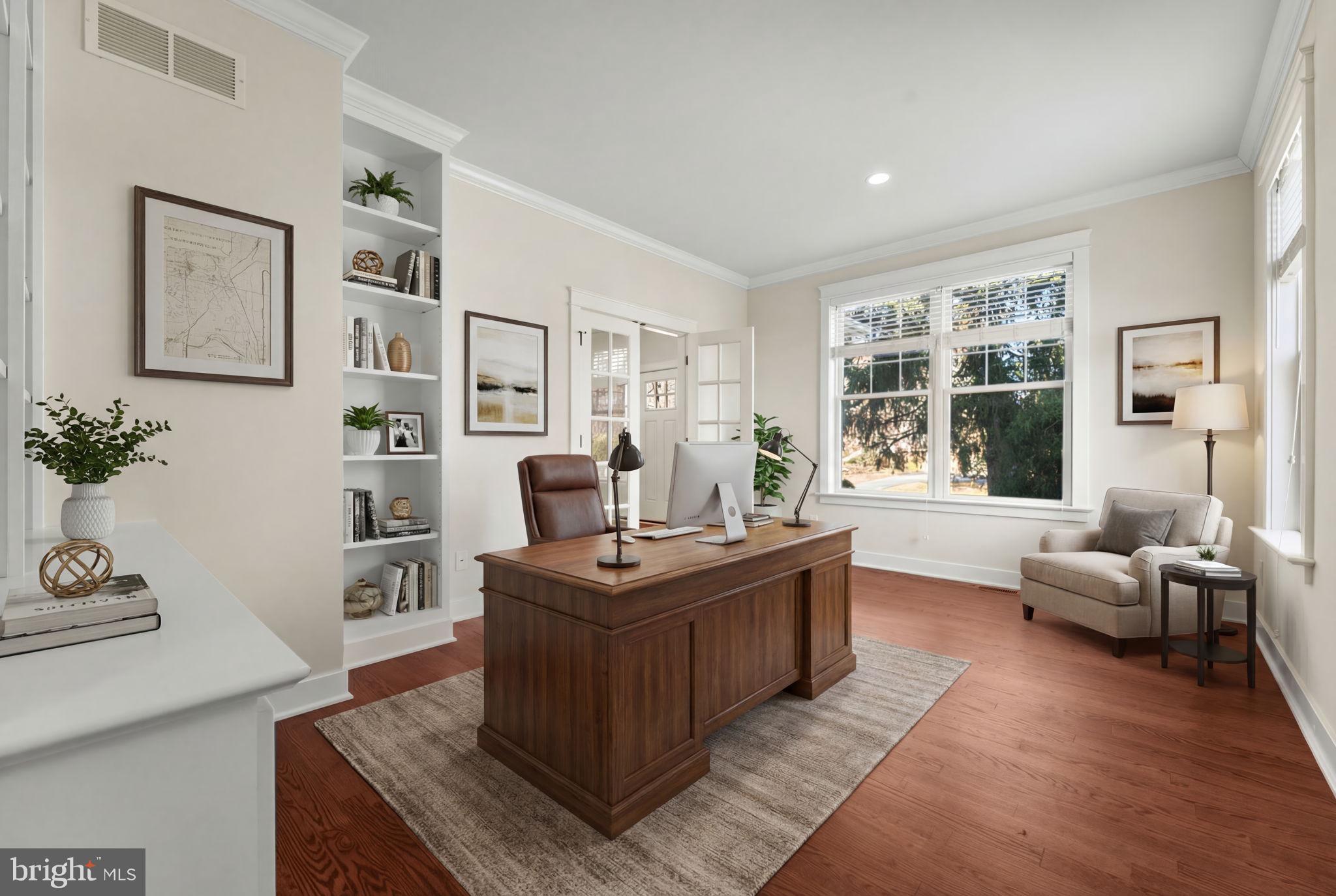 129 Conestoga Road Malvern, PA 19355 - Photo 9 of 69 a living room with furniture and a large window