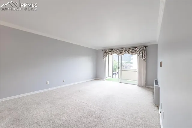 a kitchen with a sink a stove and refrigerator