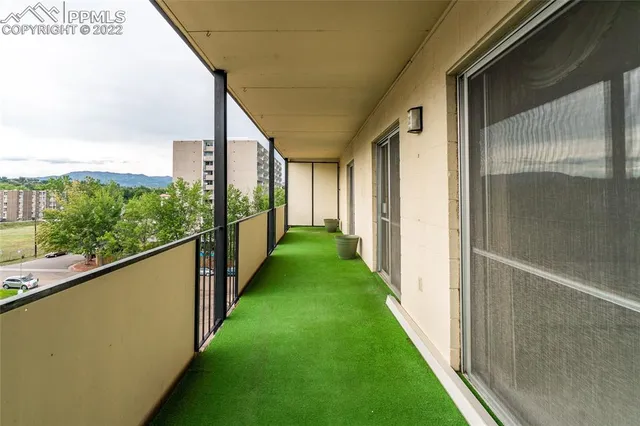 a view of a city with mountains in the background