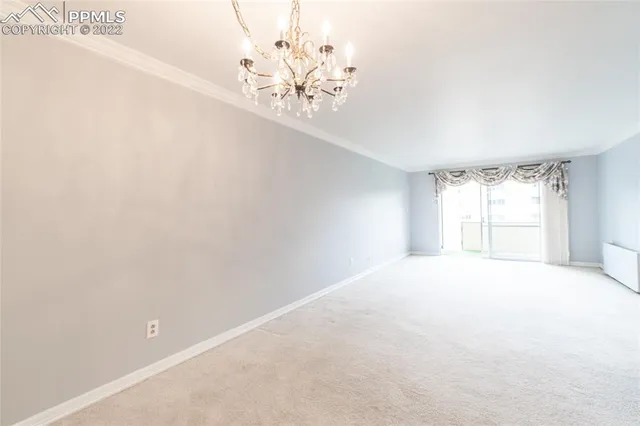 a view of a livingroom with a chandelier