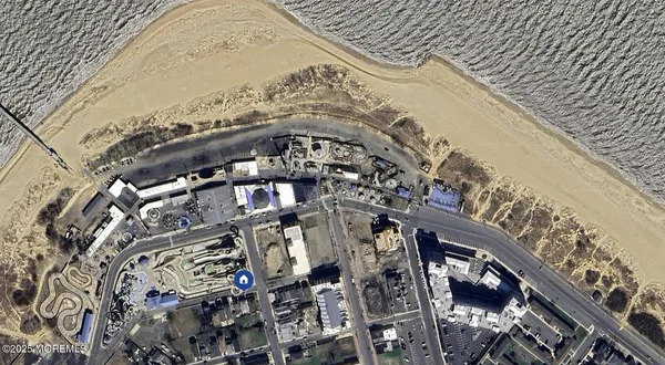 a bathroom with a sink vanity and mirror