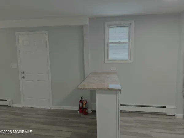 a view of hallway with livingroom