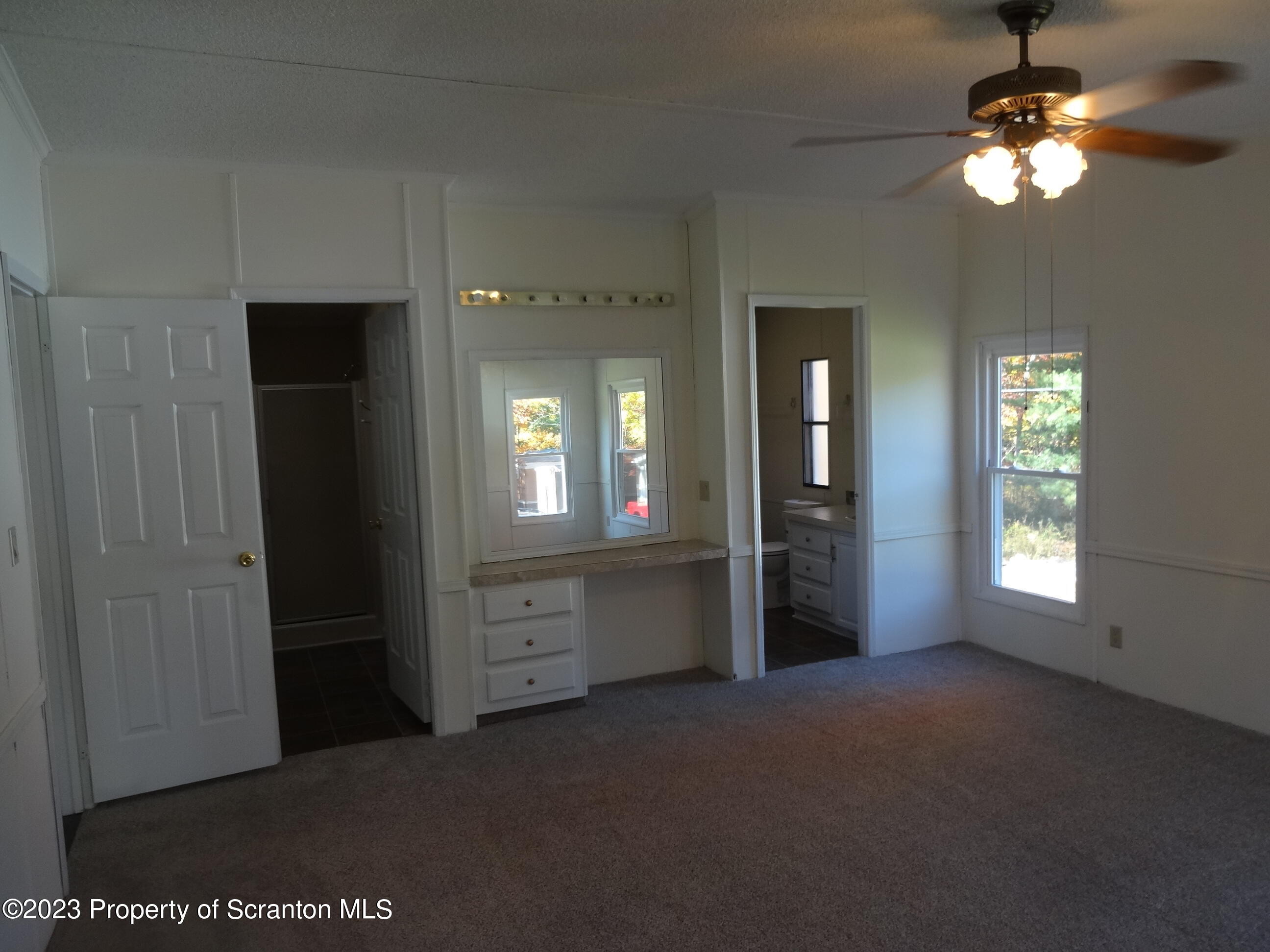 15 Hi View Lake Ariel, PA 18436 - Photo 11 of 21 an empty room with windows and cabinet