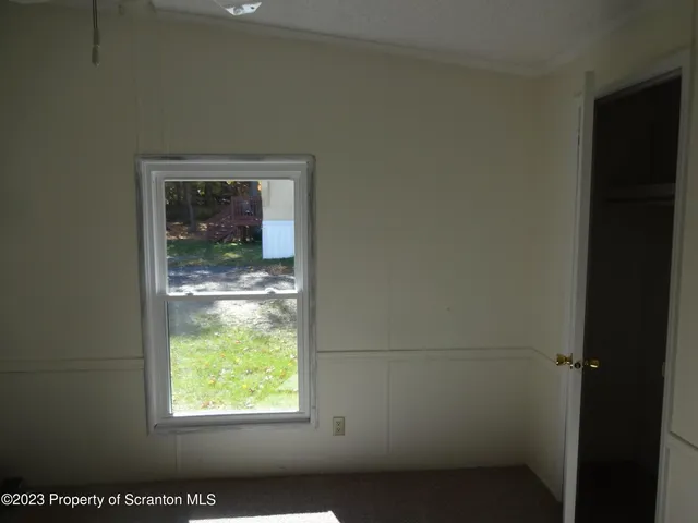 a view of an entryway with a window