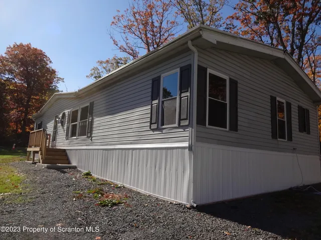 a view of a house with a roof deck