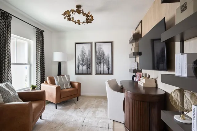 a spacious bedroom with a bed and furniture