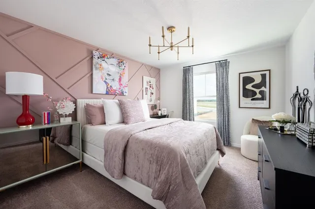 a bedroom with bed and a window