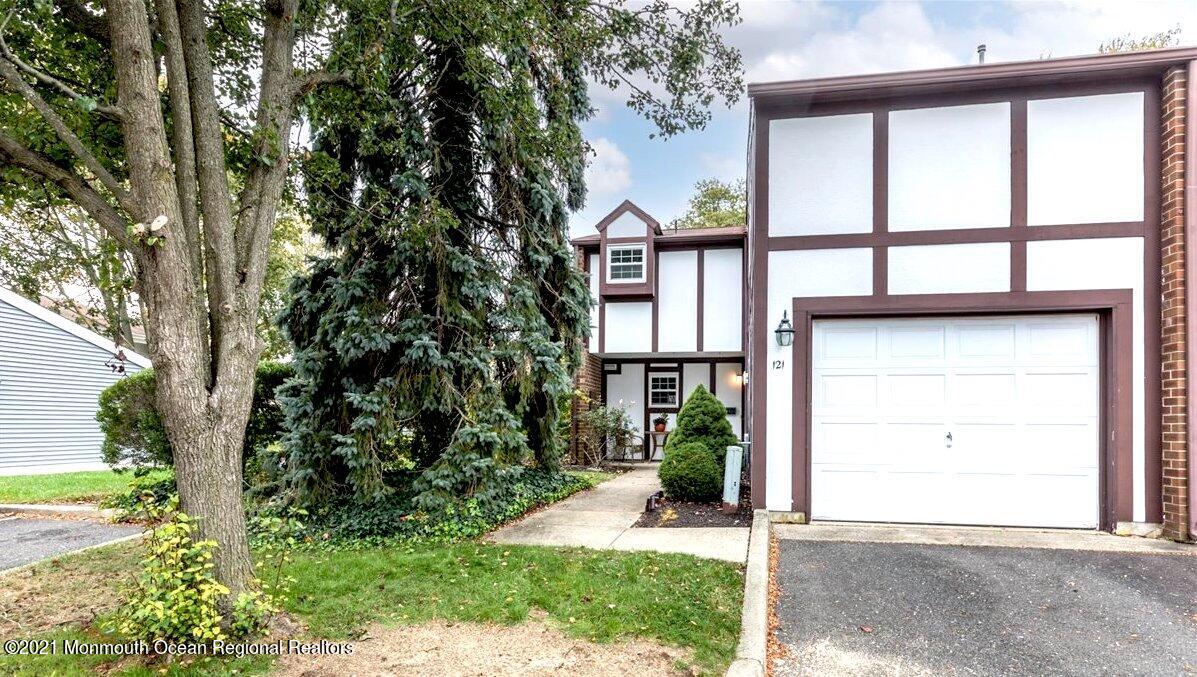 121 Walnut Drive Spring Lake Heights, NJ 07762 - Photo 2 of 44 front view of a house with a yard