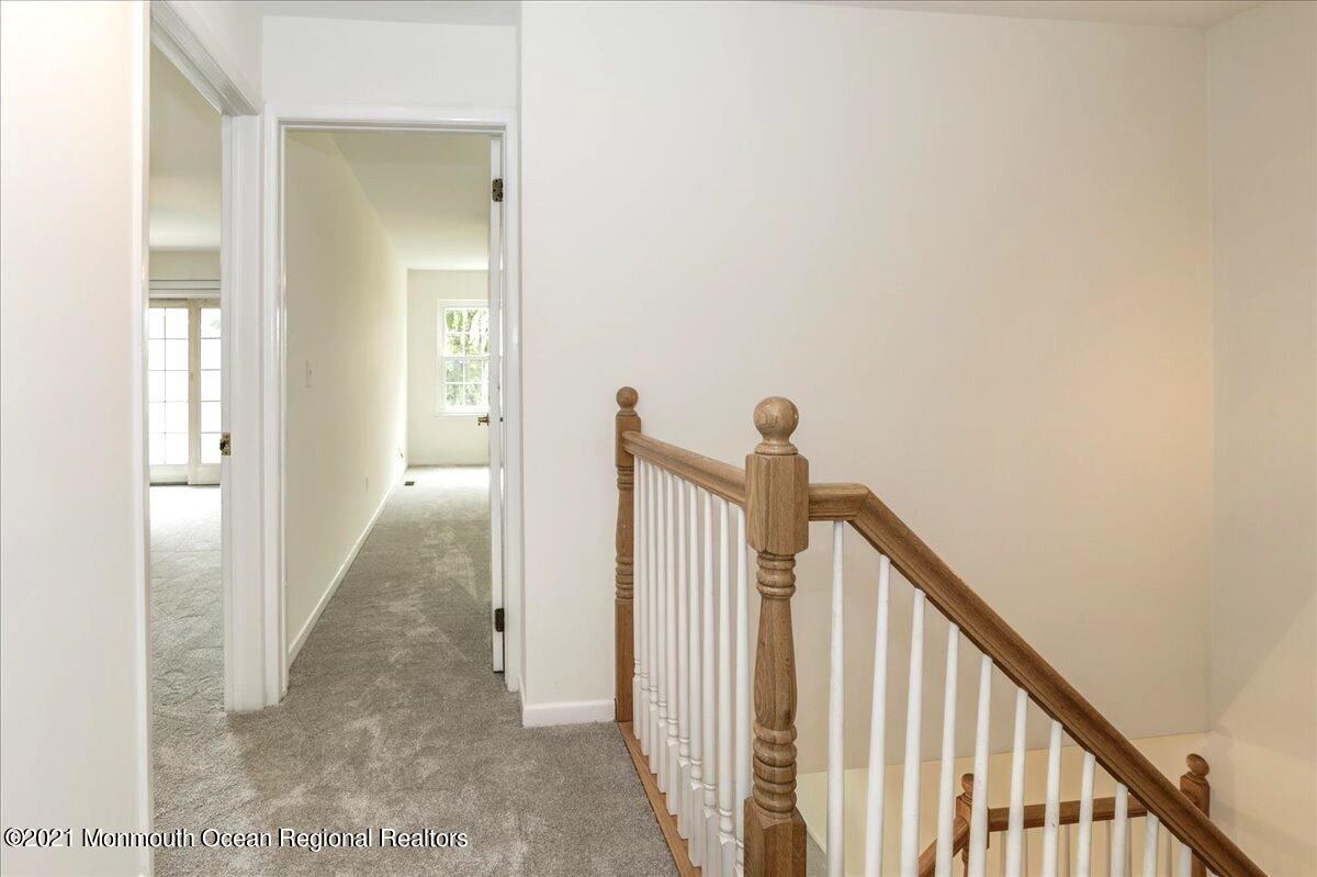 121 Walnut Drive Spring Lake Heights, NJ 07762 - Photo 12 of 44 a view of a hallway with wooden floor and entryway