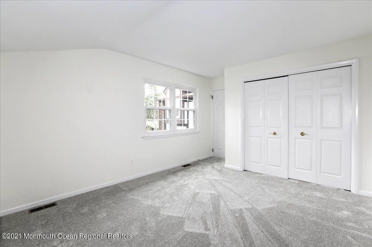 121 Walnut Drive Spring Lake Heights, NJ 07762 - Photo 14 of 44 a view of an empty room with a window
