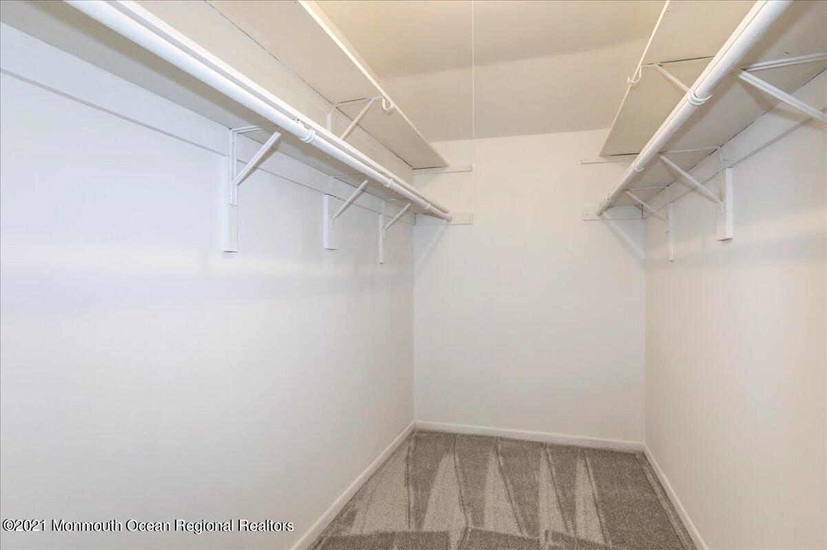 121 Walnut Drive Spring Lake Heights, NJ 07762 - Photo 16 of 44 a view of small space with racks on the wall