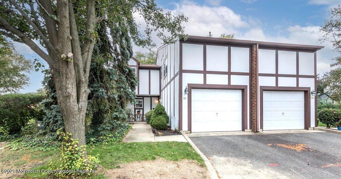 121 Walnut Drive Spring Lake Heights, NJ 07762 - Photo 3 of 44 a view of a house with a garden