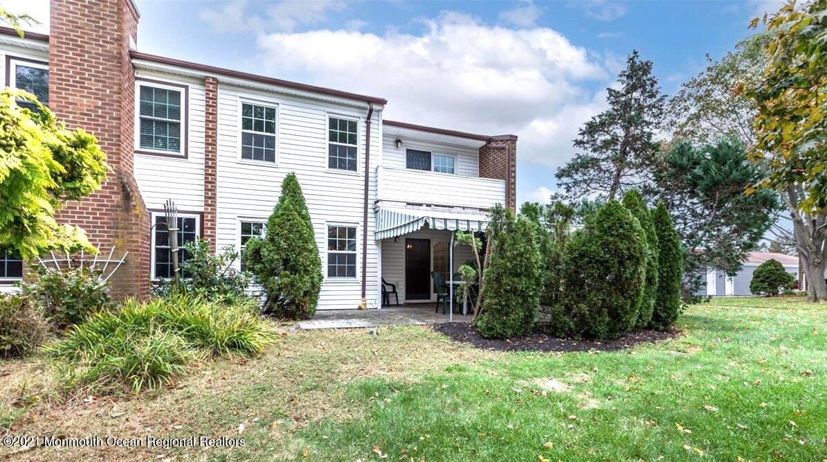 121 Walnut Drive Spring Lake Heights, NJ 07762 - Photo 29 of 44 a view of a house with backyard and a garden