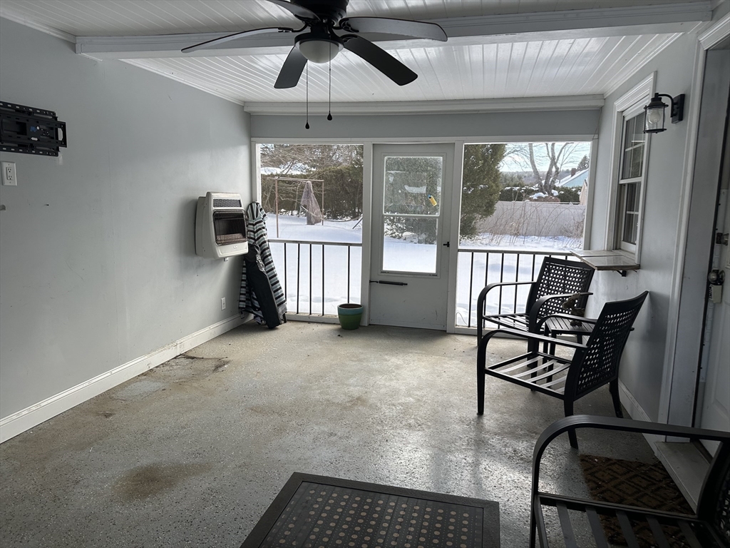 310 Palmer Road Ware, MA 01082 - Photo 12 of 16 a view of a livingroom with furniture and a window