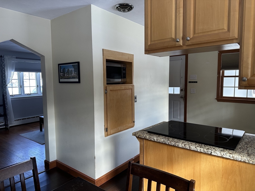 310 Palmer Road Ware, MA 01082 - Photo 3 of 16 a kitchen with stainless steel appliances granite countertop a sink and a refrigerator