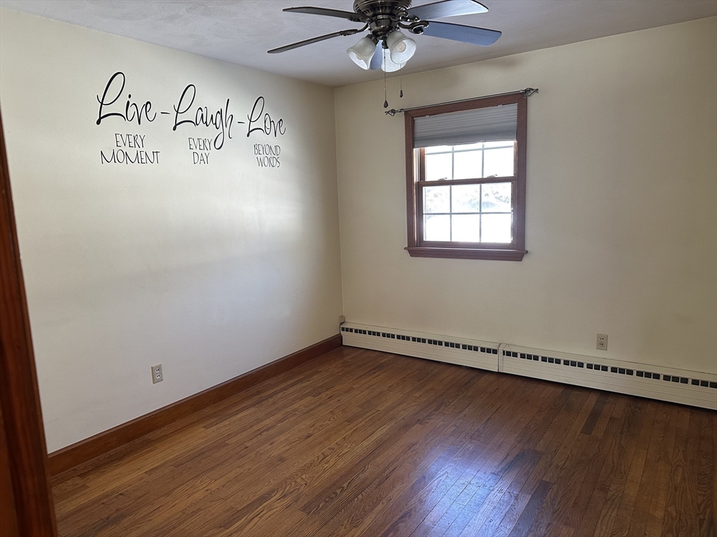 310 Palmer Road Ware, MA 01082 - Photo 9 of 16 a view of a room with wooden floor and fan