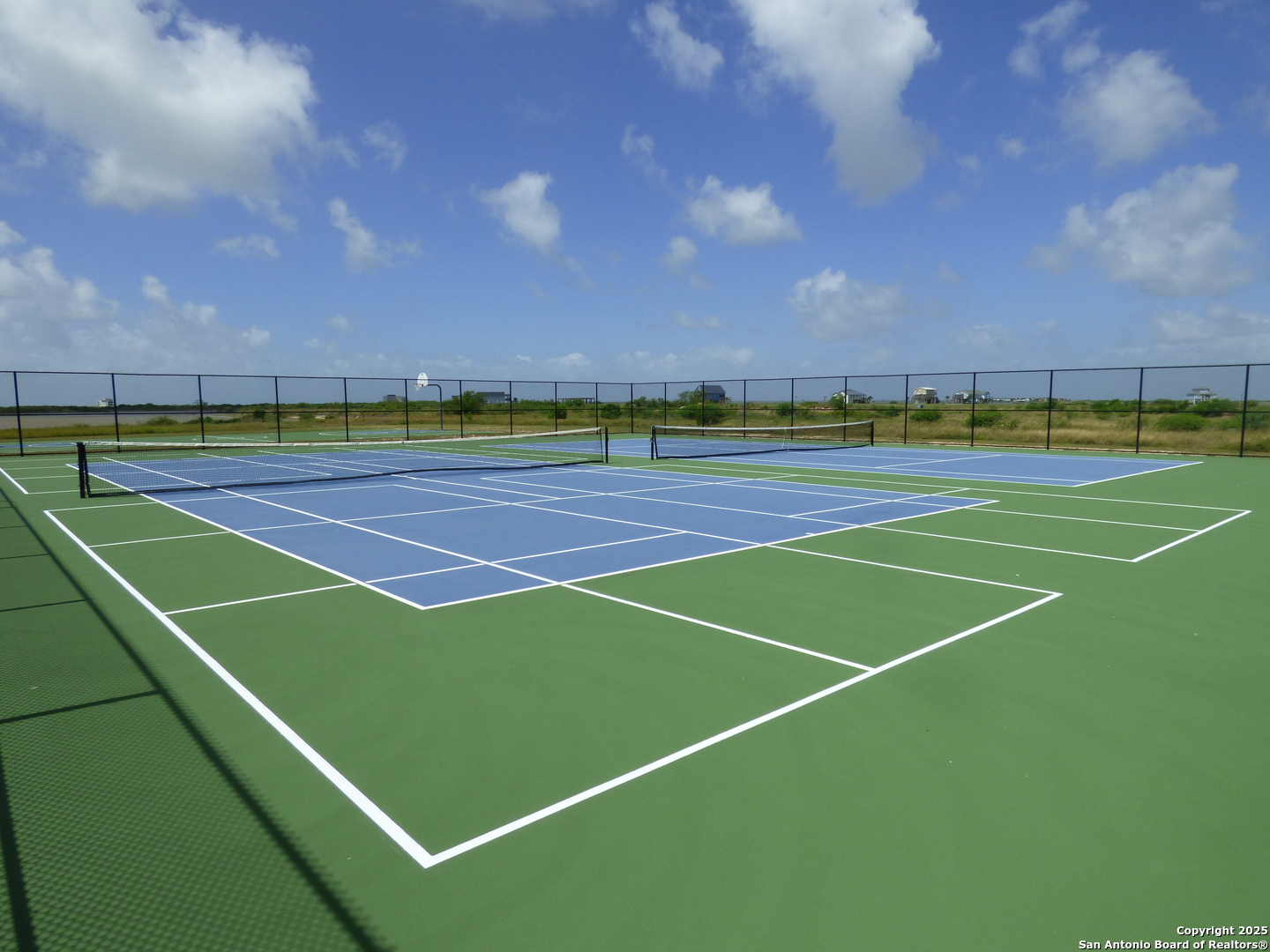 3414 Beachside Boulevard Palacios, TX 77465 - Photo 12 of 22 a view of an outdoor space and tennis court