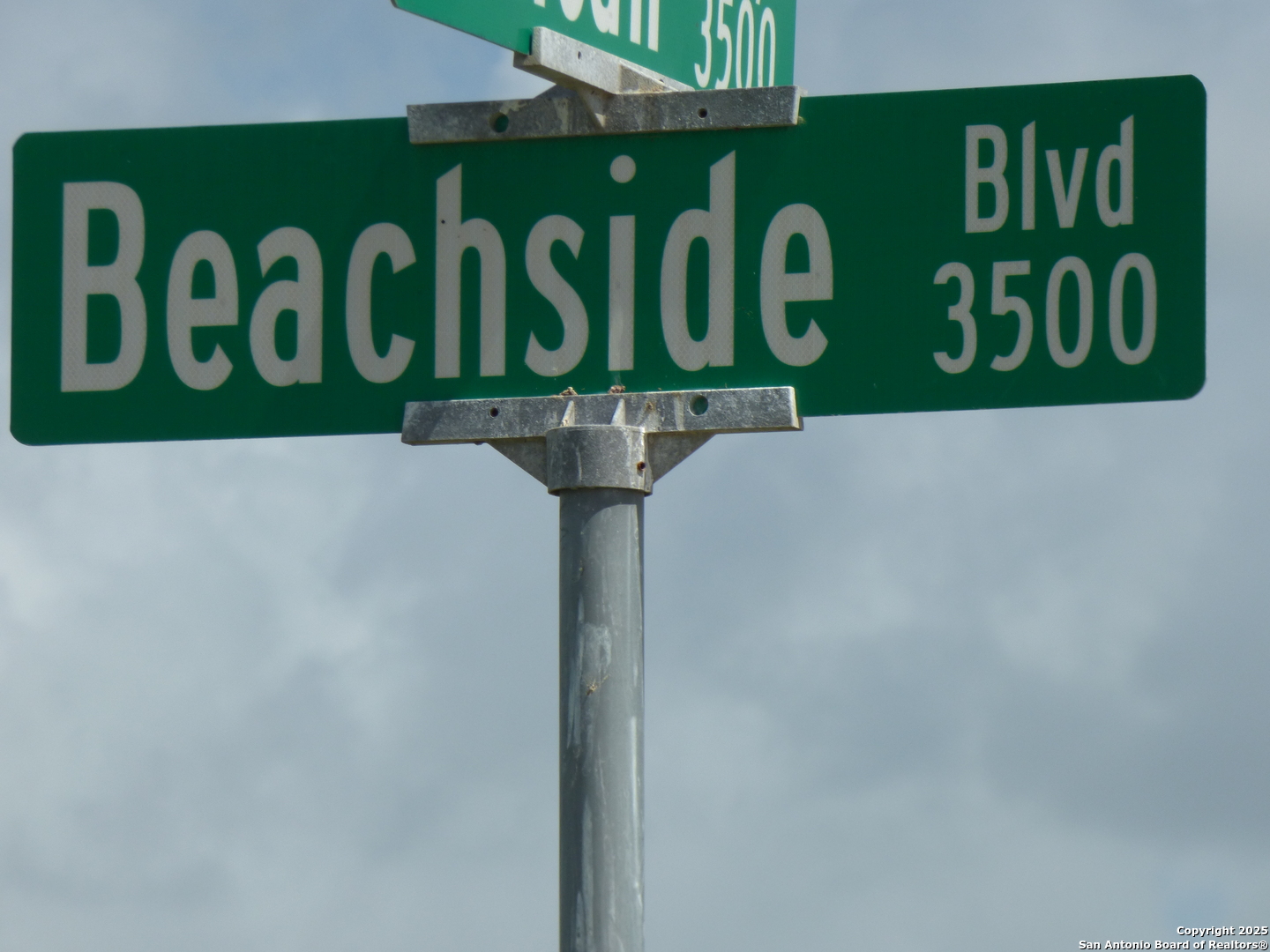 3414 Beachside Boulevard Palacios, TX 77465 - Photo 15 of 22 a close up of a street sign