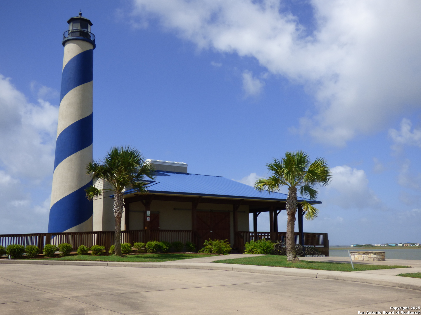 3414 Beachside Boulevard Palacios, TX 77465 - Photo 18 of 22 a front view of a house with a garden