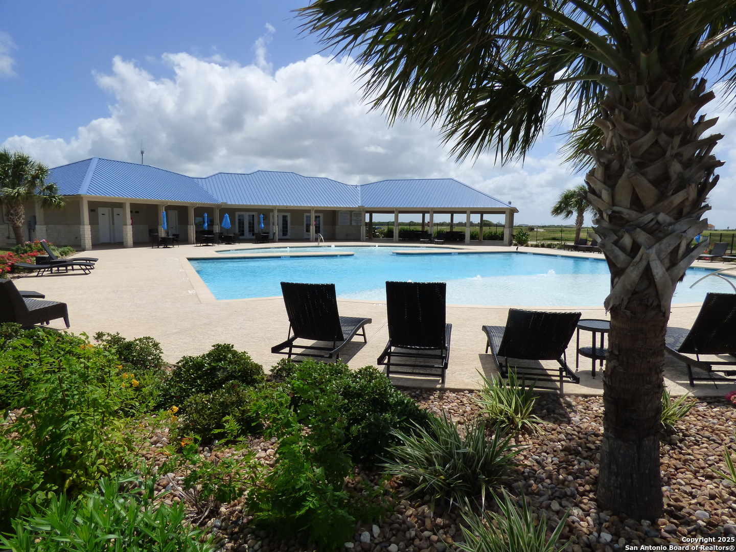 3414 Beachside Boulevard Palacios, TX 77465 - Photo 7 of 22 a view of a house with pool and sitting area