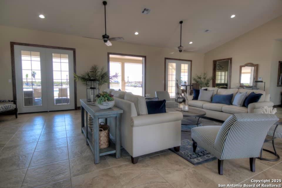3414 Beachside Boulevard Palacios, TX 77465 - Photo 9 of 22 a living room with furniture and a large window