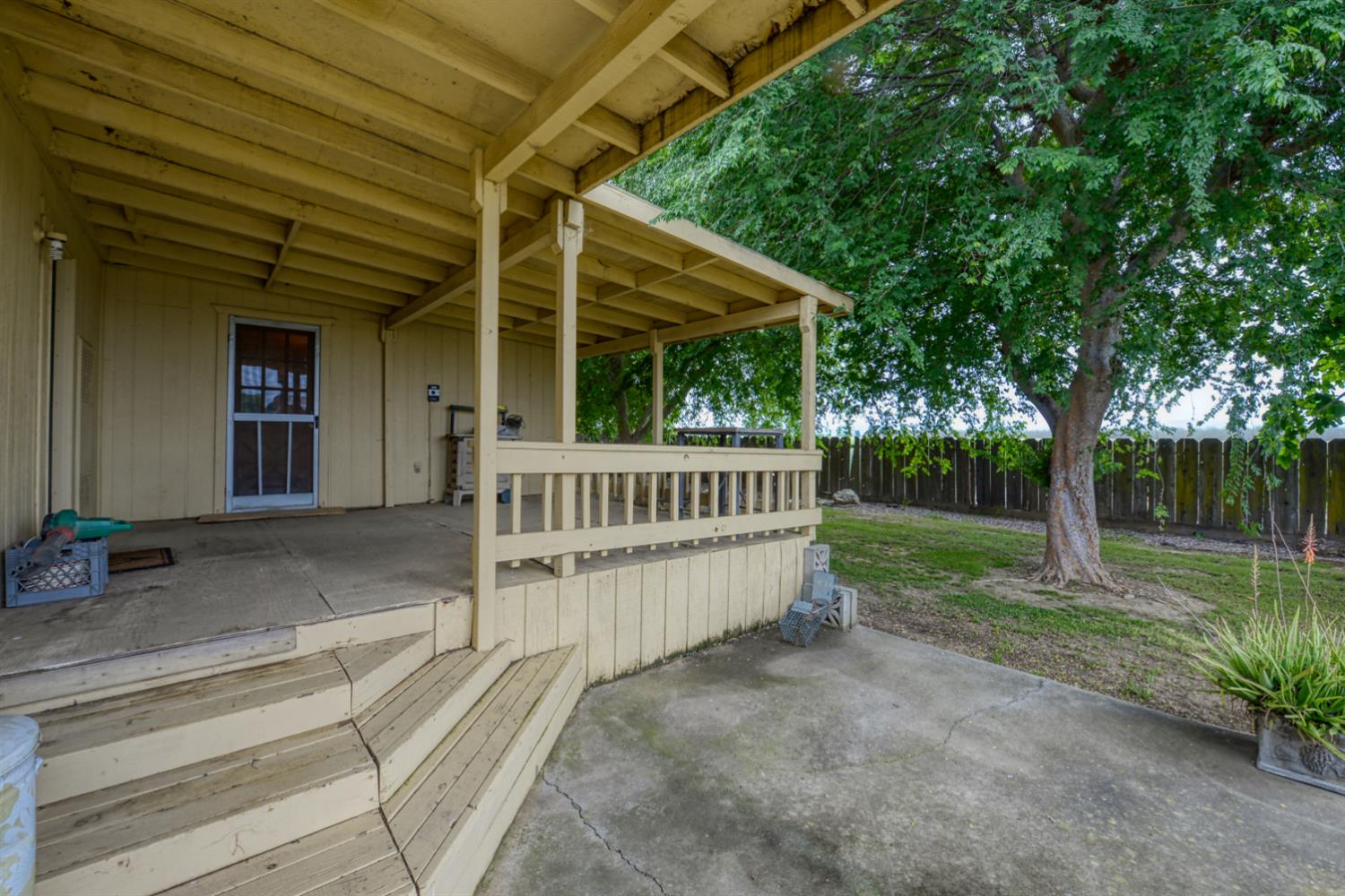 1471 Highway 33 Gustine, CA 95322 - Photo 37 of 57 a view of a house with a yard and deck