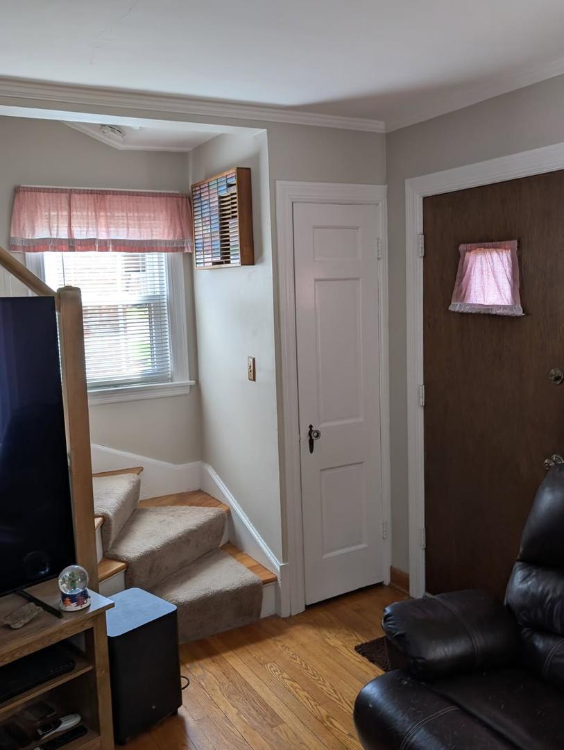 1673 Linden Street Des Plaines, IL 60018 - Photo 5 of 9 a living room with furniture and a window